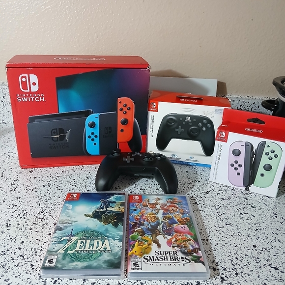 Nintendo Switch Console with Neon Red and Blue Joy-Con | Wireless Remote Bundle